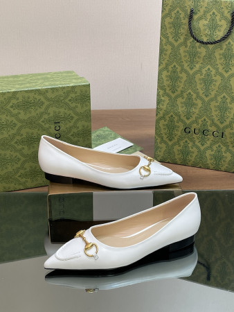 ua G*u*i women's horsebit ballet flat