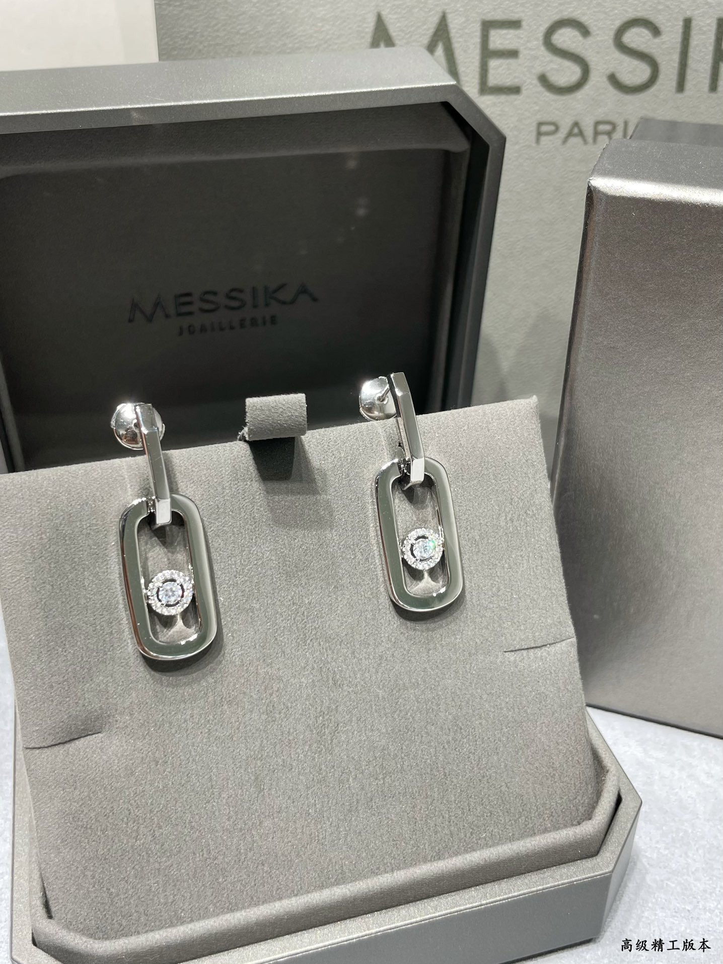 messika large single Di*m*nd moving stud earrings