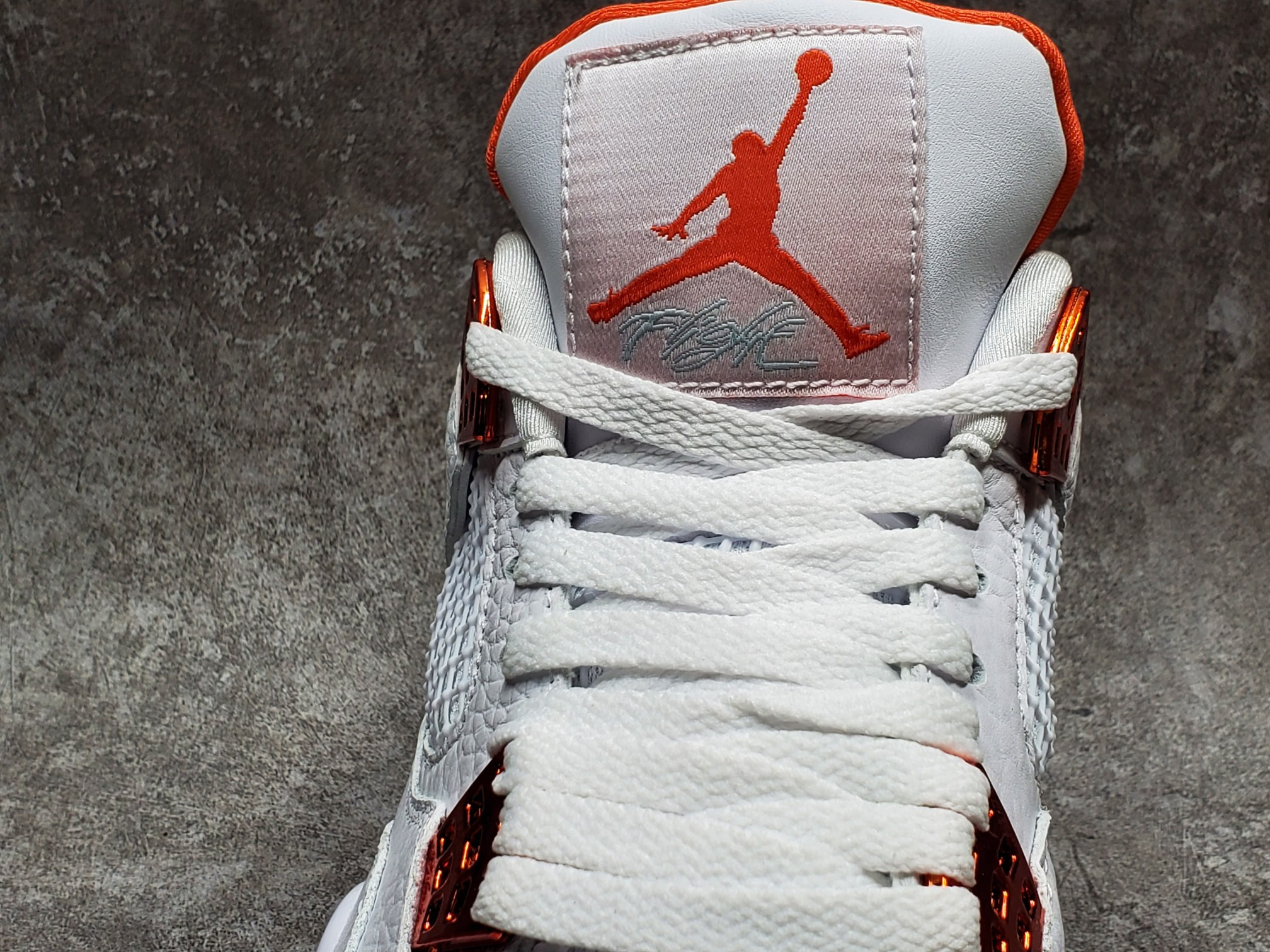 Air Jordan 4 Retro Metallic Orange