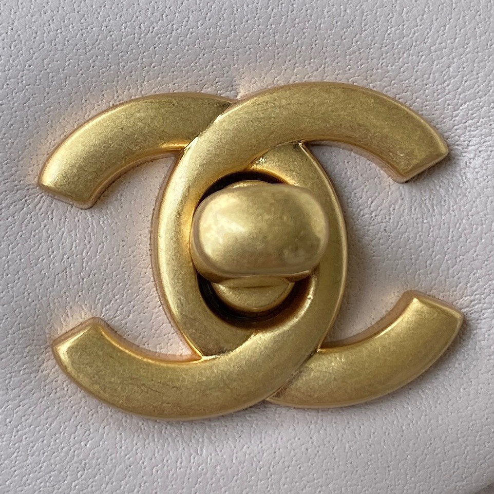 Ch*el mini flap bag shiny calfskin & gold-tone metal light pink 4.7 × 7.8 × 2.3 in