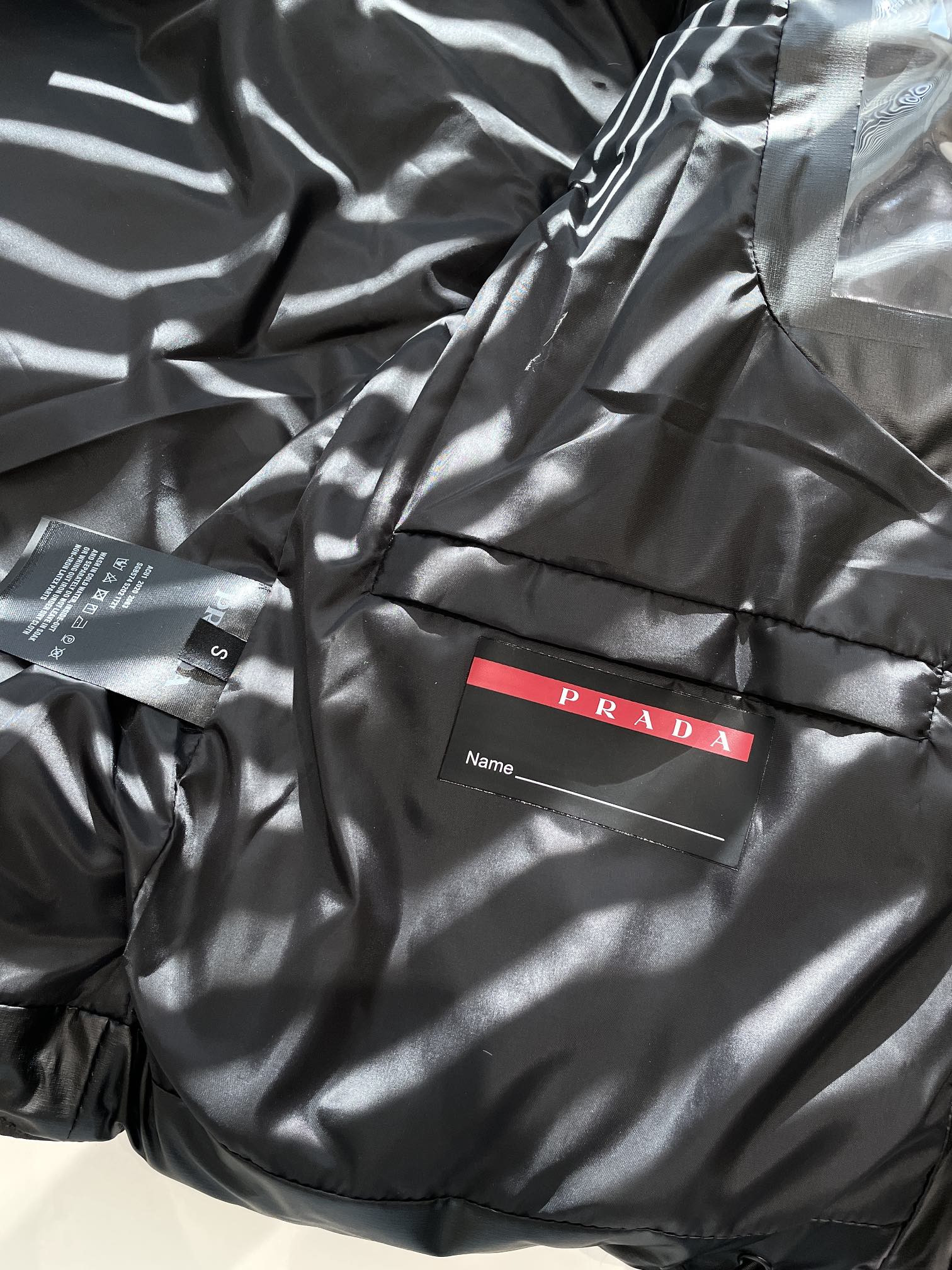 Pra*a light re-nylon hooded puffer jacket